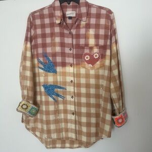 Upcycled flannel shirt with hand-sewn appliqués. Featuring love and peace ☮️ ❤️